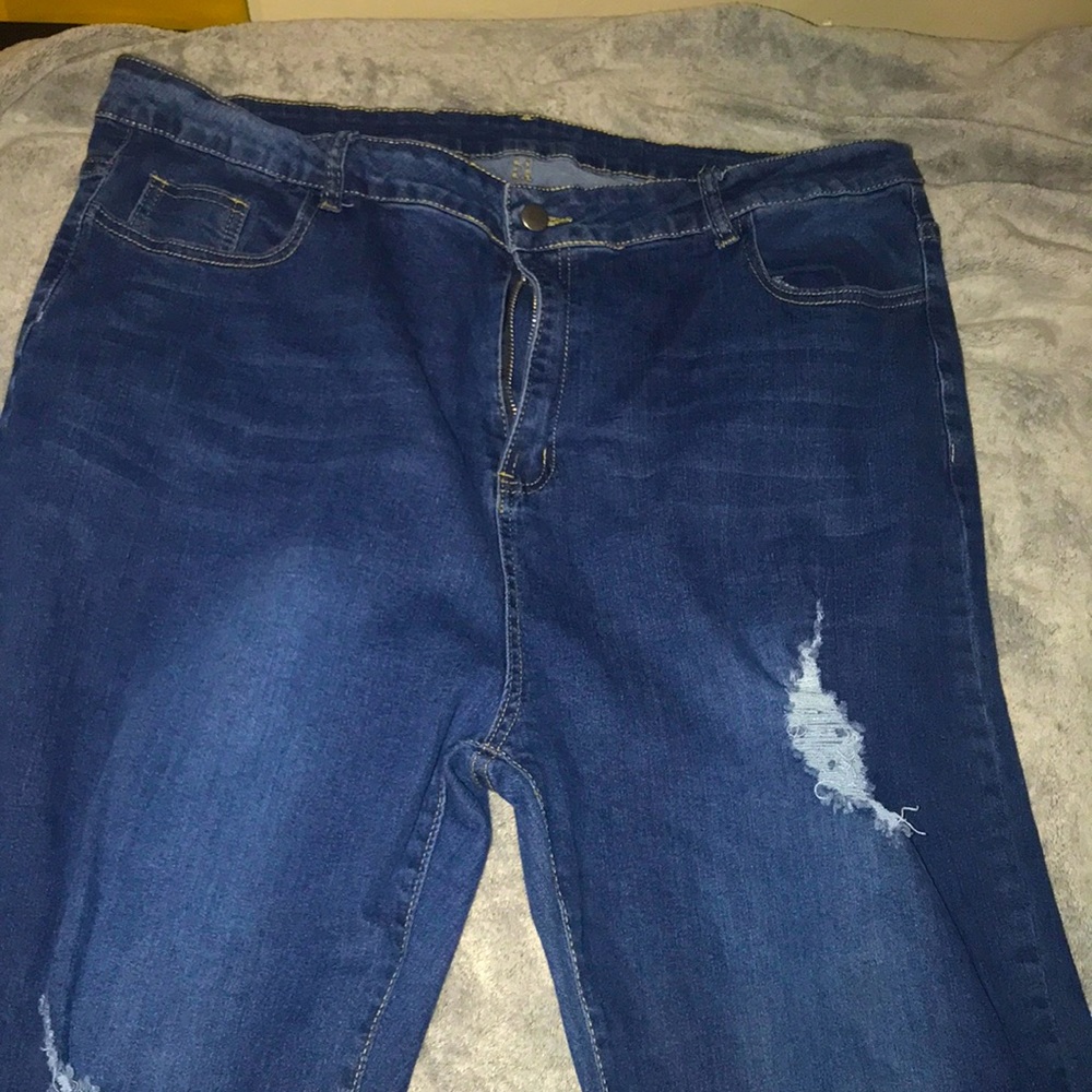 Ripped Blue Jeans